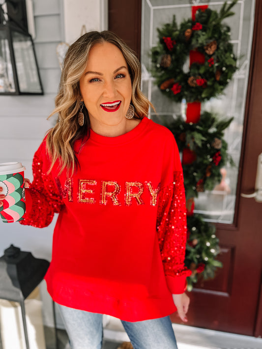 Red sequin Christmas sweatshirt with Merry detail. Merry Sweatshirt